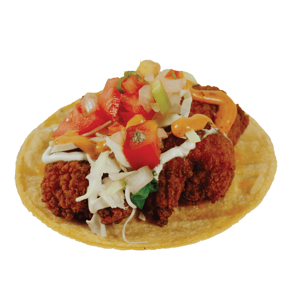Delicious crispy fish taco with fresh vegetables and toppings at Wahoo's Fish Taco.