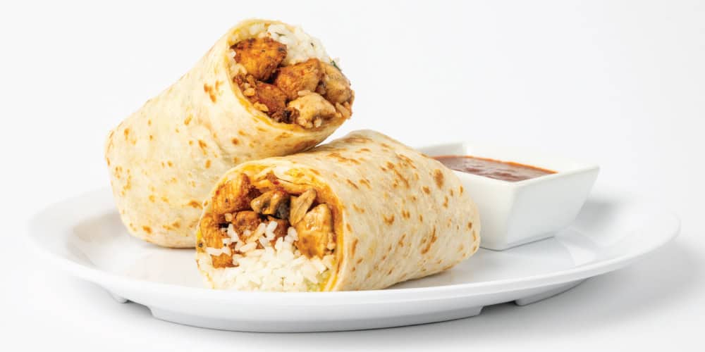 Wahoo's Fish Taco with chicken filling and side of salsa.