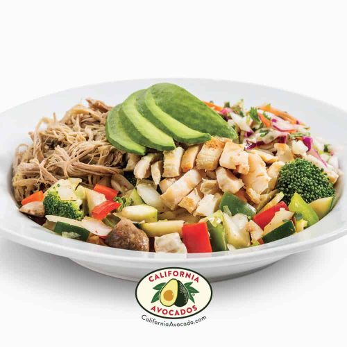 Fresh fish taco salad with avocado, chicken, and vegetables at Wahoo's.